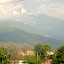 Not sure if you can see,  but there's an impressive rainbow bouncing over this hill!