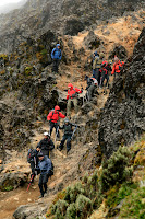 Another group hiking back down - note the walking poles, mountaineering gear and guide. Must be the scouts.