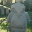 Bird statue with a worm in his mouth