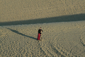 Lynette after her first sand board run! Taking the practical and far more fun option of face first diving...