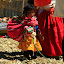One of the cute kids that will one day be herding tourists of her very own.