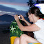 Lynette caught trying to catch a sunset.