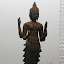 This is Brahma, god of creation, usually idientafiable due to his head having four faces.
