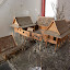 A scale model of a traditional Thai home; requiers good weather and a stepladder.