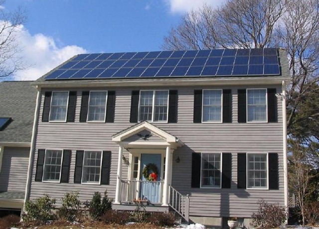 [Photovoltaic solar panels on a house roof[1][3].jpg]