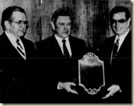 Kodak presents plaque to Elder Boyd K Packer, left