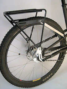 Sherpa Rear (Right) – Load Limit: 18kg – $200The Sherpa Rear offers the same versatility as the Cold Springs in a minimalist package. Popular for its lack of a load-stop at the front, you can pack it’s top shelf with those extra long items (tents, baguettes, etc…).