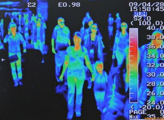 RNPS IMAGES OF THE YEAR 2009 - A thermal scanner shows the heat signature of passengers from an international flight arriving at Incheon airport, west of Seoul April 28, 2009. Airlines suffered an 11.1 percent fall in passenger numbers in March year-on-year, and swine flu stands to compound financial problems and suppress traffic even more, an industry body said on Tuesday.  REUTERS/Jung Yeon-je (SOUTH KOREA HEALTH TRANSPORT TRAVEL IMAGES OF THE DAY)