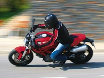 [0807_07_z+2009_ducati_monster_696+side_view[6].jpg]