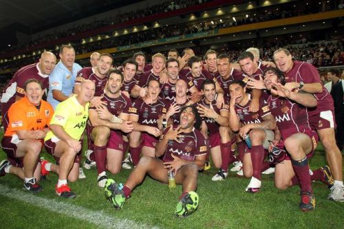 the Maroons celebrating the fifth consecutive series win
