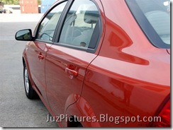 2010_chevrolet_aveo-red-front-side-doors