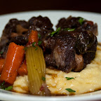 Oxtails Braised in Red Wine. Served with Georgia Polenta