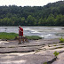 On the rocks by the river