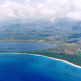 Vista aérea de la Laguna Limon, el cano hacia el mar, la Playa Limon, la desembocadura del Ro Cedro y los arrocales al otro lado del rio Cedro - en El Cedro, Miches, Dominican Republic - http://www.rancholacueva.com