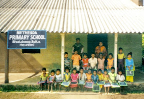 Children outside the old community center in 2006
