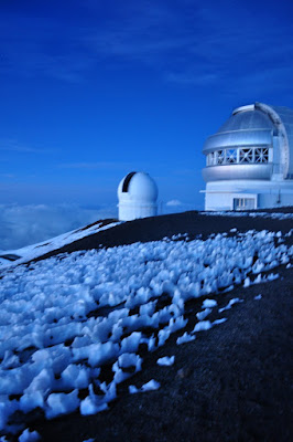 Observatories and snow atop Mauna Kea - Big Island Hawaii. Photo by Lisa Callagher Onizuka