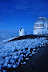 Observatories and snow atop Mauna Kea - Big Island Hawaii. Photo by Lisa Callagher Onizuka