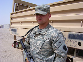 Spc. Timothy Markle stands by an Army truck at Contingency Operating Base Adder, Iraq. He cites the military as his primary inspiration for turning his life around by giving him the structure, discipline and motivation he truly needed. (U.S. Army photo by Sgt. Andy Mehler)