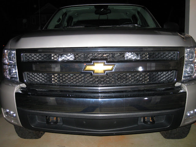 behind grill fog lights