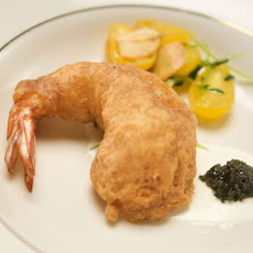 Buttermilk Battered Shrimp with California Sturgeon Caviar and Creme Fraiche Over Pea Sprout and Tomato Salad