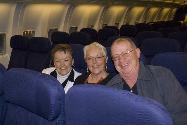 [Rockey, Dick & Maxine on planeLeaving for Honolulu 10-23-09[2].jpg]