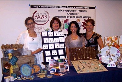 Front Page Photo of artisans for the Women's Expo article