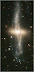 'Polar Ring' Galaxy NGC 4650A - A Disk of Red Stars Ringed By Dust, Gas, and More Stars.jpg