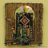 Icon, K.M. Newton, 2006  Medium: found objects, computer components, paint   Dimensions: 10 inches by 12 inches     Showings & Awards:  Contemporary Art Gallery - April 2006 - SELU - Hammond , LA Senior Exhibition