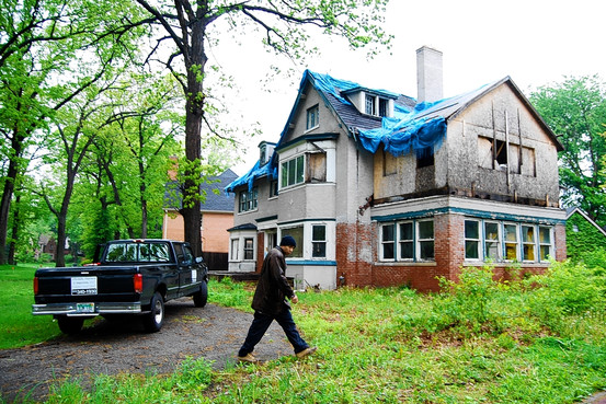 Mitt Romney's boyhood home is among 3,000 derelict structures Detroit plans to demolish by the end of September as it attacks blight and crime. Krishnan Anantharaman / The Wall Street Journal