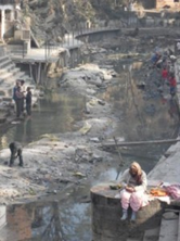 Depleted: the river inside Kathmandu Pashupati Hindu Temple is used for religious ceremonies, washing and bathing but has run almost dry after a rainless winter. Picture: Emma Kemp.