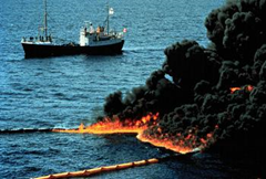 Oil from the Deepwater Horizon well is burned off the surface of the Gulf of Mexico. April 28, 2010 (Photo courtesy U.S. Coast Guard)