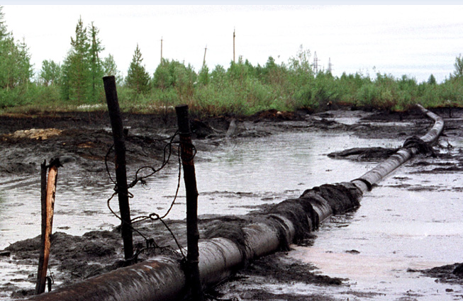 Oil from a pipeline leaks into wetlands close to the Arctic Circle in northern Russia. Greenpeace estimated in 2000 that 15 million tons of crude oil leak out of Russia's pipeline system every year. While most of this is due to aging material and lack of service, thawing permafrost could add to the problem by destabilizing pipeline foundations. (Photo: Reuters)