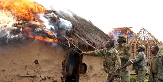 Armed forest guards burn houses belonging to members of the Ogiek community during an exercise to evict squatters from Kipkurere Forest in Uasin Gishu District four years ago. The Kenya government is putting together a team of security officers from three agencies in readiness for expected evictions in Mau Forest, the Nation has learnt. PHOTO: JARED NYATAYA