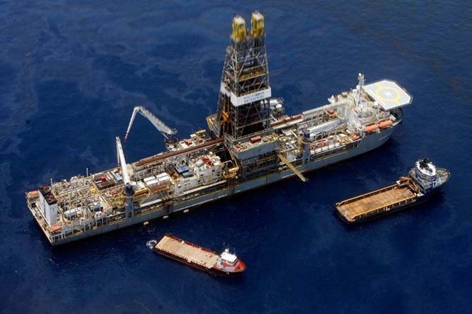 The Discoverer Enterprise, seen Saturday, 29 May 2010, at the site of the BP Deepwater Horizon explosion 50 miles offshore from Louisisana, will be used to place the LMRP, or the blowout preventer with a cap attached to a riser tube that will suction oil from the well and feed it to a ship on the surface. This is also the ship with the insertion tube being used to capture oil from one of the leaks. JOHN MCCUSKER / THE TIMES-PICAYUNE