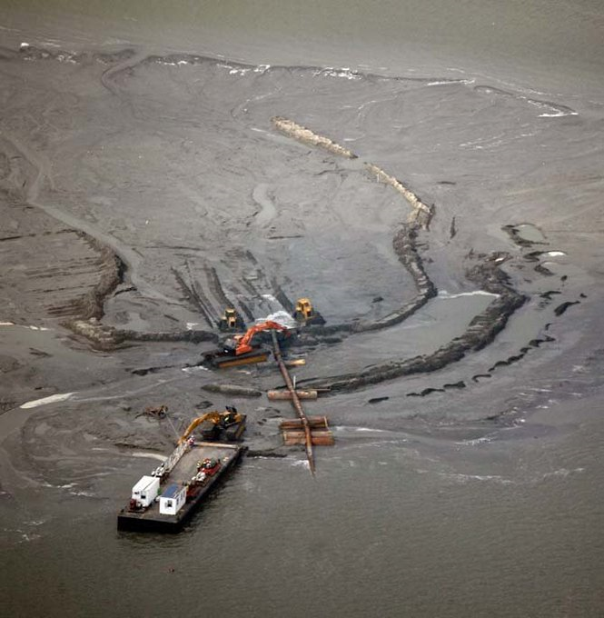 A dredging operation in the Chandeleur Islands Saturday, June 19, 2010, to build protective berms against the BP / Gulf oil spill. JOHN MCCUSKER / THE TIMES-PICAYUNE