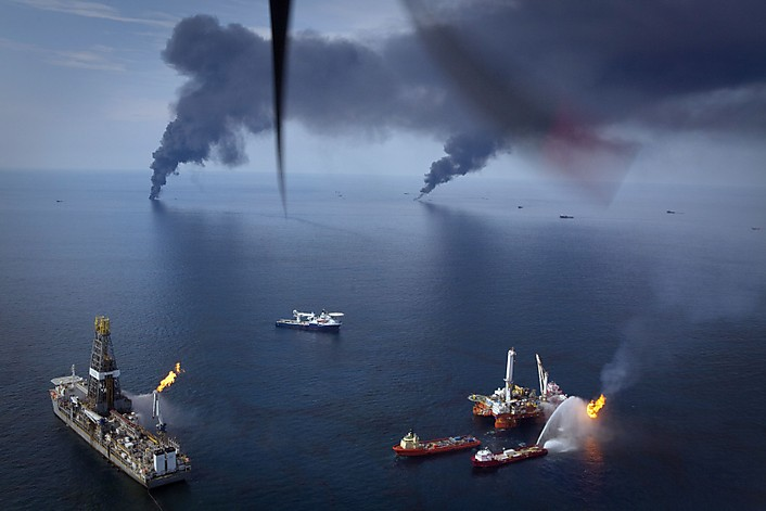 Oil is burned off the surface of the water near the source of the Deepwater Horizon spill in the Gulf of Mexico, June 19, 2010. Lee Celano / Reuters