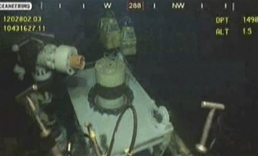 This image taken from video provided by BP PLC at 15:13 CDT shows that oil has stopped flowing from the new 75-ton cap atop the site of the Deepwater Horizon oil spill in the Gulf of Mexico Thursday, July 15, 2010. Takeover talk has faded since BP put a cap on the Gulf oil leak Thursday, but debate has begun as to how valuable to company will be after it finished paying the cost of the oil spill. AP Photo / BP PLC