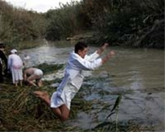 Baptism in the River Jordan. via terradaily.com