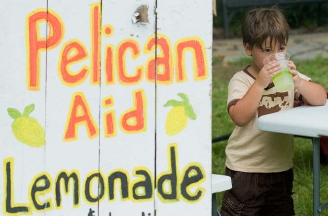 Faubourg St. John neighbor Jonathan Bush, 4, center, tastes some of his Pelican Aid lemonade to make sure it has the right flavor before serving it Saturday, July 24th, 2010 at the corner of Esplanade and Mystery Streets by Fortier Park in New Orleans. Jonathan, now 4 years old, says that all proceeds will go to help pelicans recovering from the Deepwater Horizon Oil Spill at the LSU Veterinary Hospital. MATTHEW HINTON / THE TIMES-PICAYUNE