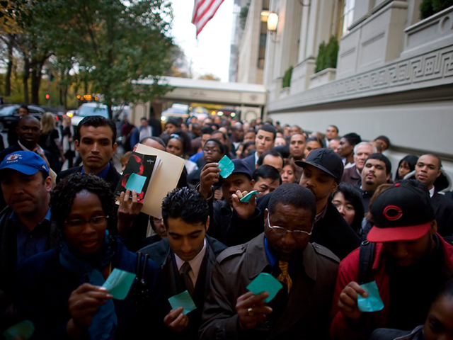 Line of unemployed people at a New York City job fair, November 2008. portfolio.com