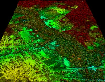A new high-resolution airborne and satellite mapping approach provides detailed information on carbon stocks in Amazonia. This image shows an area of road building and development adjacent to primary forest in red tones, and secondary forest regrowth in green tones. Image from the Carnegie Airborne Observatory, Carnegie Institution for Science