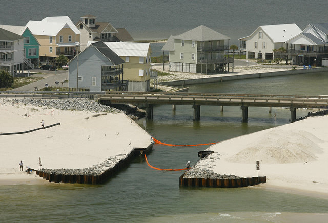 Boom is deployed at Little Lagoon Pass on Tuesday, 27 July 2010, in Gulf Shores. An Alabama Army National Guard helicopter crew from the 226th Maneuver Enhancement Brigade at Fort Whiting toured boom efforts along the Mississippi and Alabama coasts. Press-Register / Mike Kittrell