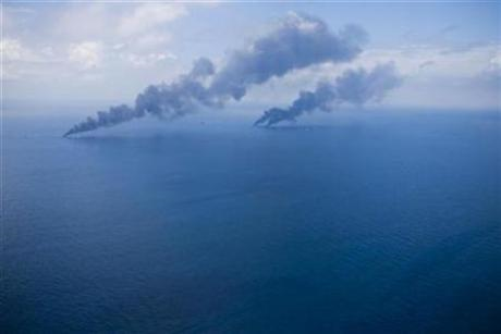 Oil is burned off the surface of the water near the source of Deepwater Horizon oil spill where BP will begin to test a new cap placed over the leak in the Gulf of Mexico off the Louisiana coast July 13, 2010. Credit: Reuters / Lee Celano