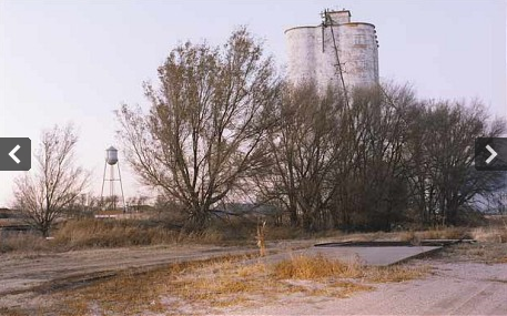 Towering grain silos now stand as empty reminders of a prosperous past in Happy, Texas. Happy's problem is that it has run out of water for its farms. Misty Keasler