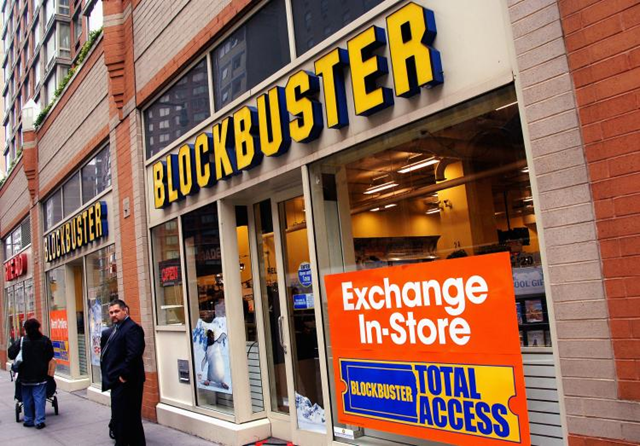 STRUGGLING: In this file photo, the exterior of a Blockbuster store is seen in New York City. Andrew H. Walker / Getty Images / theepochtimes.com