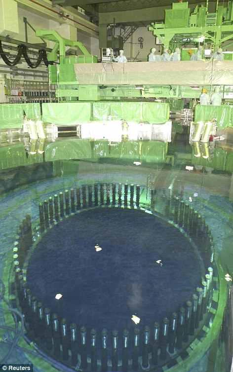 Boiled dry: This shot shows of the inside of reactor number four at the Fukushima nuclear plant before the disaster. The spent fuel storage pool is seen at the front of the shot. The rods are at the bottom of the pool. Reuters / dailymail.co.uk