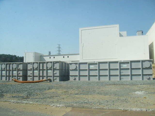 Temporary storage tank for radioactive water at the Fukushima Daiichi nuclear plant. In order to cool the fuel rods, water has been continually pumped in and radioactive water has been pumped out or has leaked out. These tanks are where the water is being stored until it can be processed. TEPCO