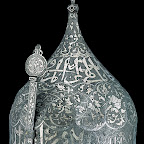 This especially attractive and well-preserved turban-shaped helmet is stamped with the mark used in the Ottoman arsenals, indicating that it, like several other turban helmets in the collection, passed into Turkish possession as booty with the Ottoman conquest of Iran and Caucasus. At least one turban helmet decorated in a style comparable to this example bears the name of Farrukh-Siar (r. 1464–1501), ruler of Shivran in the Caucasus. Such evidence suggests that the Museum's helmet is also of Shivran manufacture.