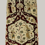 Textiles of the Safavid period demonstrate the technical mastery of the weavers as well as their strong dependence upon book illustration and illumination as a pattern source, at least in the products of court workshops. This example features a lattice pattern formed by staggered rows of lobed medallions. The princely pastime of falconry is the subject of the medallion scenes: the bird sits on her master's gloved hand while an attendant, holding a receptacle and a bag for the game, approaches. A duck flies away from the falconer. The background of these scenes was once covered with metal thread, now mostly worn