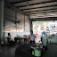 A godawful food place we were forced to stop at. Loi said only to eat eggs and rice, trust nothing else they'd cook. "Why don't you eat meat?" asked the woman there when we left. "Why don't you clean your kitchen now and then?!" was Loi's reply